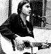 teenage Steve with guitar